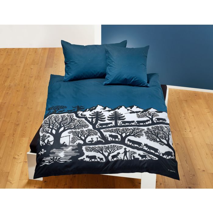 Linge de lit avec motif alpin en noir et blanc sur fond bleu