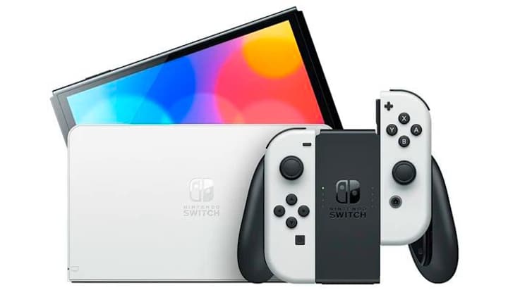 Nintendo Switch (modèle OLED) avec station d’accueil et manettes Joy-Con blanches